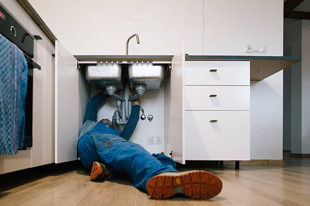 Professional Emergency Plumber technician working in Chester, WV